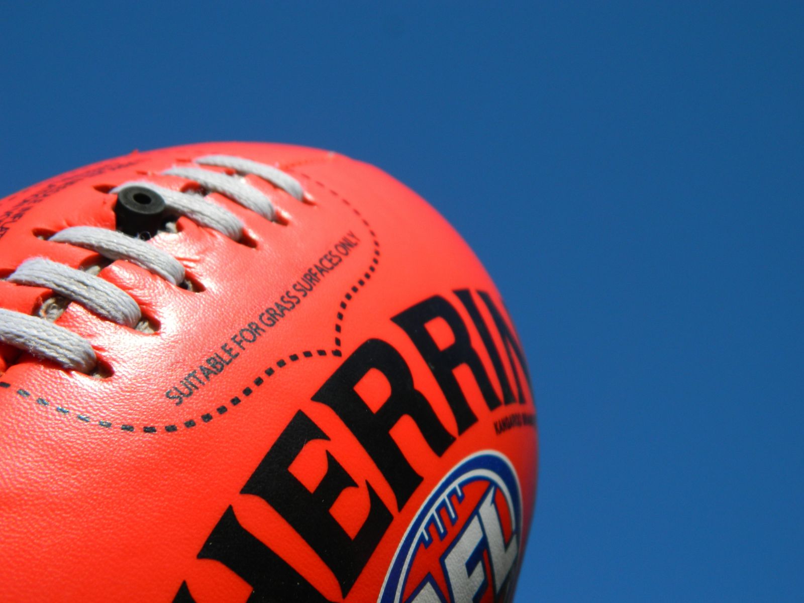 Sherrin Football on blue background